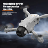 White drone with camera on a dark background, featuring text about its features.